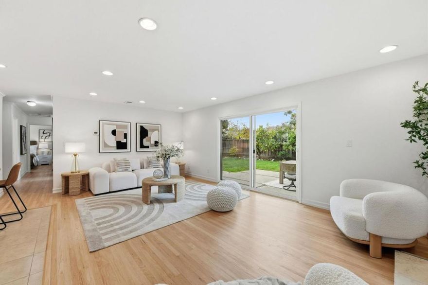 Welcome to a beautifully updated home in the well-established Valley View Reed neighborhood, ideally positioned on a generous corner lot. Upon entering, you are greeted by an open, sunlit floor plan where the living room, kitchen, and dining area blend effortlessly, perfect for entertaining and comfortable daily living. The chef-inspired kitchen boasts quartz countertops, a standalone range w/ an overhead hood, and a breakfast nook. Thoughtful updates include tastefully remodeled bathrooms, gleaming hardwood floors throughout, fresh interior and exterior paint, recessed lighting, dual-pane windows, and A/C for year-round comfort. Step outside to a meticulously landscaped backyard with multiple fruit trees. Enjoy a short walk to Paul Moore Park, with shopping, dining, and major commute routes all close by. Easy access to Highways 85, 17, and 280. This home offers the ideal balance of comfort, convenience, and possibility. Move in and start making memories!