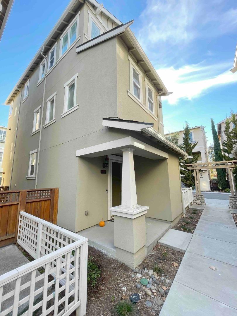 Spacious and bright Pulte home with a very practical floor plan. 1 bed/office and 1 bath on ground level. Master suite and 2 bedrooms and hall bath on 3rd level. Powder room on main level. High ceilings and wood flooring throughout. Balcony, patio, and sideyard. Stainless steel kitchen appliances. Solar system installed. Nearby playground and walking trail. Close to Lake Elizabeth, library, all transportation, extra parking space available.