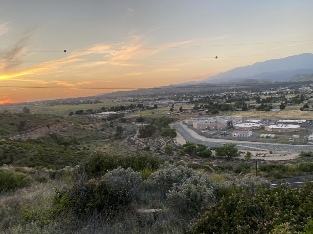 This 1.65-acre residential lot is an incredible opportunity! With its stunning panoramic views of the valley below, proximity to nature, and the attraction of nearby amenities, it's truly a developer's dream. Covered in wildflowers, the blend of elevated rock formations accompanied by the large, nearly flat, central terrain is perfect and makes for a private and luxurious home site while not disturbing the beauty of the surrounding drama. Approximately 1-mile distance up Hwy 243 toward Idyllwild the property provides a peaceful, elevated setting, and with the lot access still to be cut by the buyer, they have the flexibility to customize the entryway to match their vision. Avoiding the hustle & bustle of the valley floor, this elevated lot can be a bit cooler in the summer yet its proximity to Banning and local attractions like the Morongo Casino, Cabazon Outlet Mall and Palm Springs (home of celebrities & Presidents) makes it a perfect blend of seclusion and convenience. This is a perfect spot for someone looking for both tranquility and easy access to shopping amenities and entertainment! You should explore further details about the area and this properties development potential.