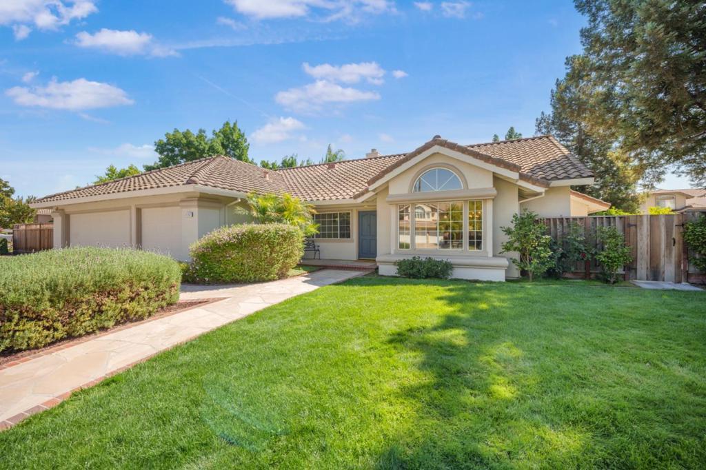 Welcome to 17157 Heatherwood Way, a beautifully crafted single-level home nestled in one of Morgan Hill's most desirable neighborhoods. This expansive residence offers approximately 3,429 square feet of thoughtfully designed living space, featuring 4 spacious bedrooms, a dedicated office, and 2.5 luxurious bathrooms. Step inside to discover high-end finishes throughout, creating a seamless blend of comfort and elegance. The kitchen features a large island, walk-in pantry with space for a freezer and custom wood cabinetry. The generous primary suite is a true retreat, complete with a walk-in closet and a spa-inspired bathroom featuring heated floors. Situated on an impressive ~15,001 sq ft lot, the outdoor space is just as stunning as the interior. Enjoy a private backyard oasis with a shaded patio, tranquil koi pond with a water feature, and an outdoor kitchen - perfect for entertaining or relaxing in peace. Additional highlights include a 3-car garage, mature landscaping, and a premium location in a sought-after neighborhood known for its quiet streets and upscale homes. This is California living at its finest - don't miss the opportunity to make it yours.