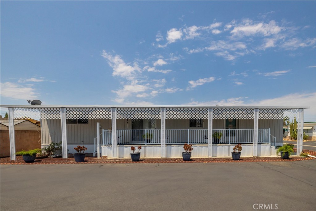 Welcome to this well-maintained manufactured home located in a desirable 55+ community. This charming 2 bedroom, 2 bathroom home features new blinds, a freshly painted exterior, and a recently refinished patio—perfect for relaxing or entertaining. The community offers wonderful amenities including a pool, spa, and clubhouse for residents to enjoy.