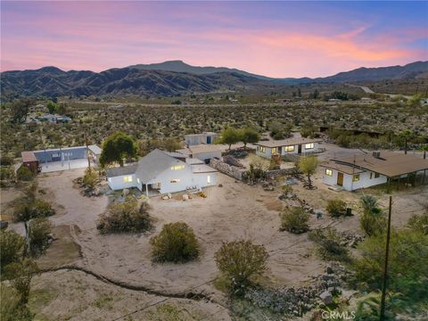 Photo of 9016 Rose Eden Drive, Morongo Valley, CA 92256 (MLS # IV25273070)