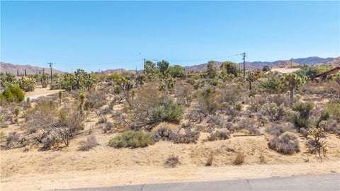 Photo of 58323 Lisbon Drive, Yucca Valley, CA 92284 (MLS # JT26185153)