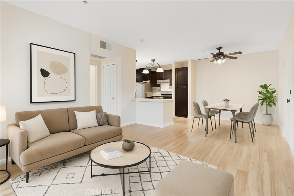 Welcome to Madison Park – A Hidden Gem in Murrieta! Discover the perfect blend of comfort, convenience, and community with this beautifully upgraded top-floor condo nestled in the highly sought-after gated community of Madison Park. This move-in-ready 1-bedroom, 1-bathroom condo offers a thoughtfully designed layout filled with natural light and modern finishes. Step into a spacious living room featuring a cozy fireplace and direct access to a private balcony, ideal for relaxing or enjoying a quiet morning coffee. The updated kitchen boasts sleek new countertops, refreshed cabinetry, and a convenient pantry for added storage. The primary bedroom offers a peaceful retreat with a walk-in closet, while the in-unit laundry room—complete with washer and dryer—adds everyday convenience. Stay comfortable year-round with central heating and air conditioning. Enjoy exclusive access to resort-style amenities, including a sparkling pool, spa, sauna, fully equipped gym, racquetball court, and media/recreation room. Host friends and family in the barbecue and picnic areas, or simply unwind in the community's tranquil setting. Located just minutes from the 15 Freeway, this condo provides easy access to local shopping, dining, and entertainment options—including the vibrant offerings of nearby Temecula. *Seller Financing Available*
