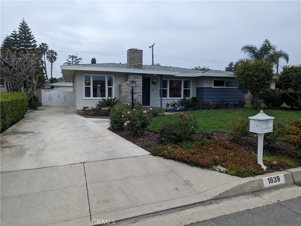 Nestled on a quiet cul-de-sac right on the Arcadia/Monrovia border, this charming single-family home offers a beautiful blend of traditional and modern styles. The interior features over 1,500 square feet of open-concept living spaces and private rooms, all enhanced by ashy wide plank flooring, large windows, and elegant crystal lighting. The house includes three bedrooms and three bathrooms, with two of the bedrooms being en-suites boasting great views of the pool, while the third bedroom overlooks the mountains. The updated kitchen, with its custom cabinetry and stylish backsplash, is conveniently located off the dining area with easy access to the backyard. The property's outdoor space is a true highlight, featuring a pool and patio perfect for entertaining. A detached two-car garage with built-in storage and a long driveway with space for an RV complete this exceptional home.