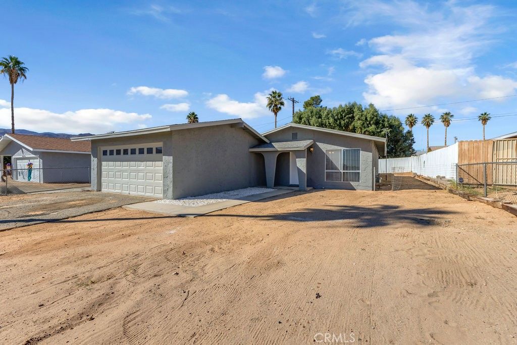 Photo of 6070 Baileya, 29 Palms, CA 92277 (MLS # DW25244054)
