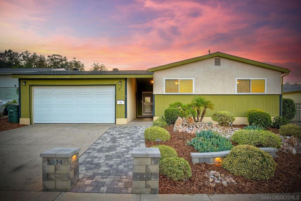 Dazzling home on a quiet street of well-kept homes just minutes from major freeways. Gleaming hardwood floors flow throughout complemented by fresh interior paint and energy efficient dual pane windows. Remodeled baths provide stylish modern comfort. A covered screened in patio bridges the area between garage to the entry expanding the living area. The professionally designed front yard features drought-tolerant landscaping enhanced by low-voltage lighting for curb appeal day and night. Topped by a newer roof!