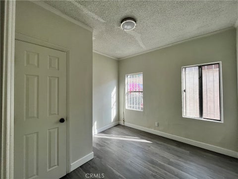 Photo of 611 W 57th ST, Los Angeles, CA 90037 (MLS # PW26177875)
