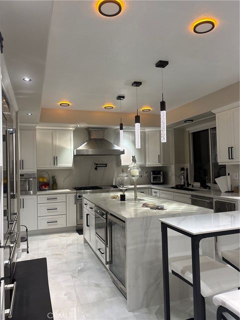 Photo of 7135 Ashley Drive Dr, Huntington Beach, CA 92648 (MLS # OC25243742)