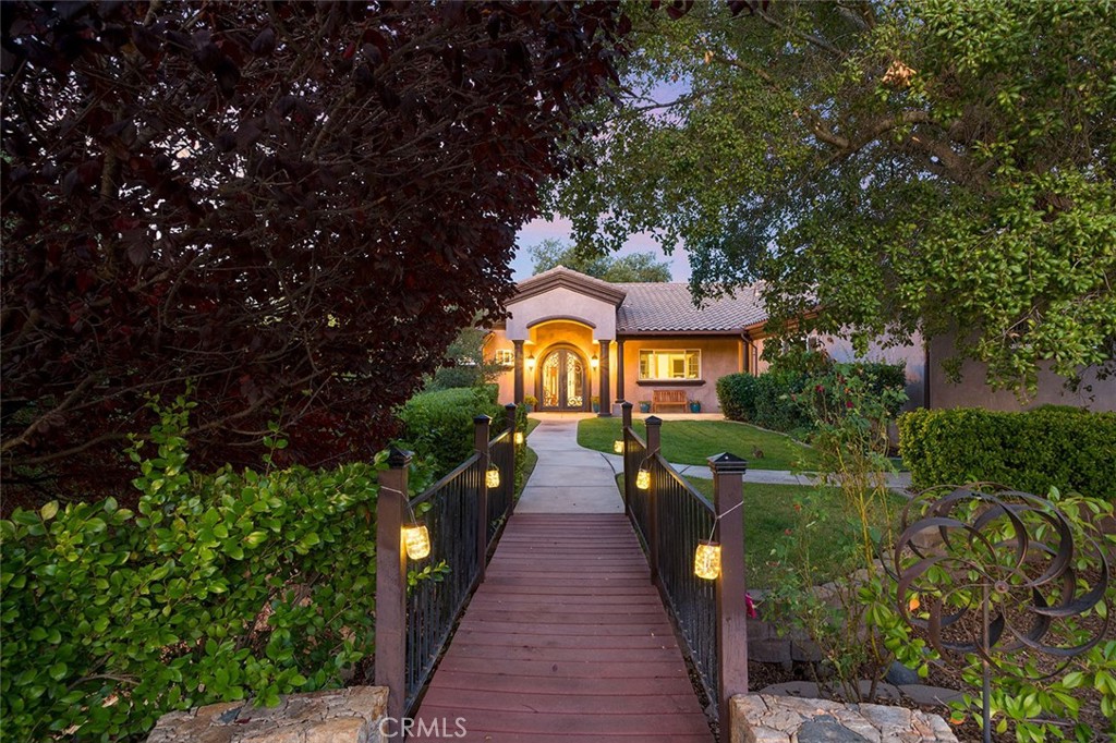 PERFECT MULTI-GENERATIONAL 6 BEDROOM/6 BATH FIVE-ACRE ESTATE IN THE HEART OF LA CRESTA HIGHLANDS! Enter through the private gate and travel up the long driveway & adorable footbridge to 5282 square feet of luxury living, tucked within a grove of ancient oak trees. This beautifully maintained estate offers single-story living on the main floor and an opportunity for the lower level, with its own entry from the exterior, to act as an expanded part of the home or as a high-end ADU. The main floor offers direct access from the oversized 4-car garage, 12-ft ceilings, chefs’ kitchen, dining room, family room with a wall of windows and ‘Heatilator’ fireplace, two guest bedrooms (one currently an office), laundry room & spacious Primary Bedroom with sitting area & ensuite bathroom with soaking tub & steam shower. The lower floor works beautifully for a large family, adult children, or as private space for guests, providing a massive living room, kitchenette, 2 guest bedrooms, bonus room/theater, 2nd laundry, 2nd Primary Suite and walk-out patio with access to the pool. Enjoy endless hours on the deck, an extension of the main floor living space, with its large, covered area, perfect for listening to the waterfall at the pool, birdwatching & even sitting outside during rainstorms. Inside, just steps from the deck is a well-appointed, open kitchen, offering ample space for the largest of gatherings in this enchanting “treehouse” vibe estate. The grounds offer a wonderland of charm, beauty & adventure, with walk paths through the fruit orchard, sitting areas beneath ancient oaks and resort-worthy pool area with fireplace, firepit, outdoor kitchen, natural rockwork, water feature & COMPLETE PRIVACY. Top off this luxury list with energy efficiencies, such as paid-for Solar, private water well and whole-house back-up 22k Generator, and you will find this TURNKEY ESTATE ready for your next adventure on the prestigious Santa Rosa Plateau! *****Discover the Santa Rosa Plateau Lifestyle…5-acre minimum parcels (10-acre minimum. in SR West), just minutes to schools, restaurants, hospitals, grocery stores, 15 Fwy & Temecula Wine Country. Enjoy this peaceful ranch community w/no commercial businesses, robust social activities, miles of private community trails & 1000s of acres of Ecological Reserve…All less than 1.5 hours from LA, SD, OC, Palm Springs & Big Bear. Discover the country, yet convenient, lifestyle of La Cresta, Tenaja & the Communities of the Santa Rosa Plateau!
