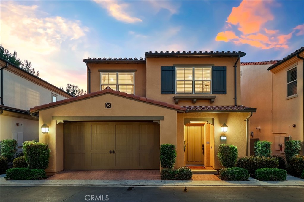 Welcome to this spectacularly upgraded 3-bedroom, 2.5-bathroom detached home in the highly sought-after Stonegate community of Irvine. Offering 1,712 sq. ft. of open living space, this residence is perfectly designed for modern comfort, entertaining, and convenience. Step inside to soaring ceilings, crown molding, and newer, rich water-proof wood-laminate flooring accented by designer paint. The chef-inspired kitchen features sleek quartz countertops, an elegant tile backsplash, a spacious eat-at island, recessed lighting, and a built-in bar area adjacent with wine cooler. Split-tilt plantation shutters add style and privacy throughout. Upstairs, the luxurious primary suite boasts a spa-like bath with dual vanities, a walk-in shower with dual shower heads, and elegant finishes. Two secondary bedrooms, a full bath, and an upstairs laundry room complete the upper level. The entire house is prewired for each room to have its own internet port and there are dual electric ports throughout. The backyard is a true highlight—a private retreat with artificial turf and a custom putting green, with the home set on a premium lot with no neighbors directly behind. Residents of Stonegate enjoy resort-style amenities, including 4 pools, spas, BBQ areas, 7 parks, shaded play structures, tot lots, tennis courts, basketball courts, and sand volleyball. Conveniently located near top-ranked Stonegate Elementary, Crean High School, Jeffrey Open Trail, Woodbury Town Center, Irvine Spectrum, and major freeways (I-5, 133, 405 & 261). This is the perfect blend of upgraded living, a premium location, and world-class community amenities—all within one of Irvine’s most desirable neighborhoods.