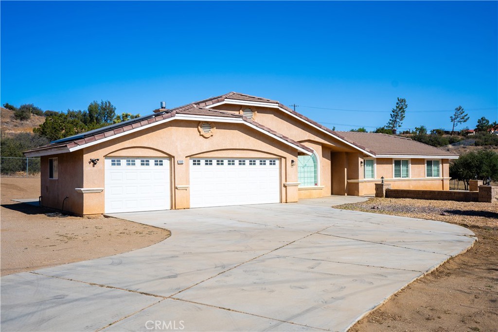 **** USE GOOGLE MAPS for directions. Apple Maps will take you to the wrong location****
Welcome to the cutest modern farmhouse in the High Desert—where comfort, charm, and convenience come together.
Move-in ready and perfectly located for commuters, this serene property offers exceptional access without compromising privacy and tranquility.
Step inside to discover a beautifully designed interior featuring updated quartzncountertops and custom mint green cabinets with an gold finishes, giving the home a warm, rustic elegance. The stainless steel appliances and walk-in pantry make the kitchen as functional as it is stylish.
Stay cozy year-round with a wood-burning stove that efficiently heats the entire home, helping to lower your winter energy bills. The spacious master bathroom offers a private retreat, complete with a soaking tub, separate shower, and double sinks. A large laundry/mud room with custom mint green cabinetry adds both charm and practicality.
Exterior highlights include:
A three-car garage
Low-maintenance landscaping
A covered patio in a peaceful, naturally private backyard surrounded by mature oak shrubs
Two sheds for additional storage (20x20 shed has power)
A long concrete driveway for ease and convenience
Fully enclosed with a 6-foot chain-link fence for added privacy and security
Solar panels for new owner to take over to save on electricity bill
This property blends modern comfort with farmhouse charm and offers everything you need to live the High Desert lifestyle in style. Don’t miss your opportunity to call this one-of-a-kind home yours!