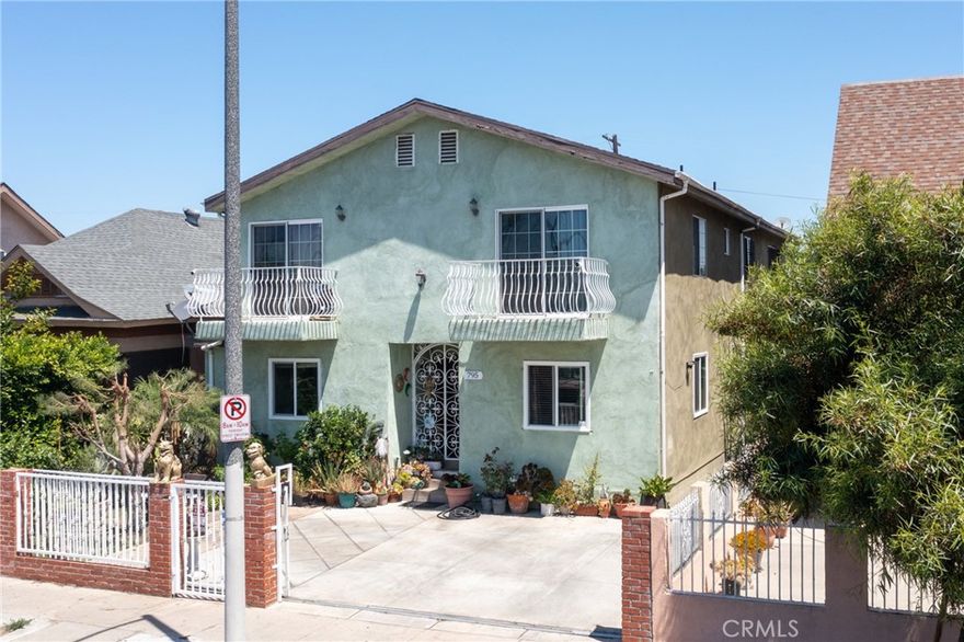 Incredible Income Opportunity in South LA that MUST BE SEEN! Welcome to the seller's SPACIOUS HOME with a LOWER PRICE offering MULTI-UNIT-STYLE living with excellent rental income POTENTIAL. Perfect for investors or extended FAMILIES, this versatile property is located just minutes from Downtown LA. The Residence features 3 Master Bedrooms and multiple living spaces including ( 4-Great BEDROOMS and 3-BATH ) 1-Bed, 1-Bath is on the Main Floor. RARE INVESTMENT opportunity! that on the First Floor one master bedroom has been converted into a Studio Apartment with its own kitchenette, on the Second Floor Conversion, one master bedroom has been converted into a 2-Bedroom, 1-Bath UNIT with its own combined living-dining area. Each Living Space Features its OWN SEPARATE ENTRANCE, providing FLEXIBLE USE options: Such as Multi-Family Living with 3,027 Sqft, 2 reliable income streams already in place or a better future just generating INCOME. PLUS a beautiful elevated cityscape VIEW of Los Angeles Skyline. PARKING!! 6 GATED PARKING SPACES in the back and carport for two, an ample front yard, with driveway for EXTRA parking in the front. A (LAR2 Zoned) Lot offers further potential for ADU or expansion (buyer to verify with city). This is a RARE find with FLEXIBLE use options and reliable income streams already in place. Conveniently located near major freeways, schools, public transportation and local amenities.
