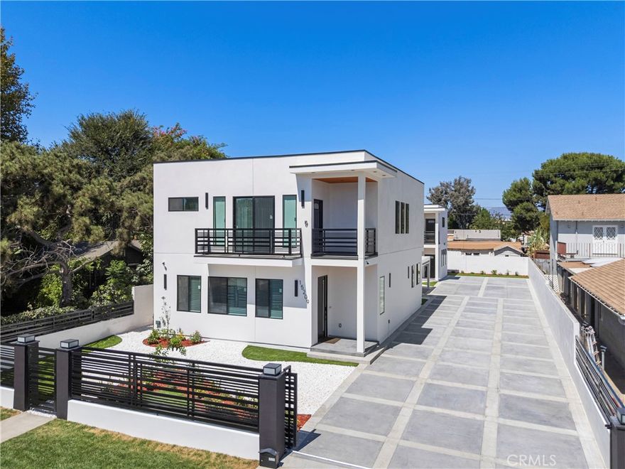 Welcome to this stunning brand-new modern residence built in 2025, located at 15209 Cohasset St, Van Nuys, CA. This contemporary 4-bedroom, 3.5-bathroom home spans an impressive 2,391 sq ft and offers a perfect blend of luxury, comfort, and functionality.



Property Highlights:



Spacious Floor Plan: Open-concept living with soaring ceilings, perfect for entertaining and everyday living.



Gourmet Kitchen: Equipped with top-of-the-line stainless steel appliances, a massive waterfall island with modern pendant lighting, sleek high-gloss cabinetry, and an elegant black marbled backsplash.



Elegant Finishes: The home features high-end polished floors with a stunning marble-like effect, recessed lighting, and a built-in contemporary fireplace that serves as the focal point of the living area.



Primary Suite: Luxurious master retreat with a private bathroom featuring a dual-sink vanity, a frameless glass shower with matte black fixtures, and modern design details throughout.



Additional Bedrooms & Bathrooms: Each room is bright and spacious, with ample closet space and stylish finishes. The bathrooms are tastefully designed with marble-style tile work and illuminated mirrors.



Outdoor Space: Enjoy a beautifully landscaped yard with modern drought-tolerant plants, redwood mulch, and a clean, contemporary aesthetic.



Parking & ADU Information:



The property includes ample parking with designated spaces for both the main house and the rear ADU (Accessory Dwelling Unit).



Main House: Access to a covered carport for secure parking.



ADU: Rented separately with its own parking area.



Driveway: Spacious and designed to accommodate multiple vehicles with ease.



Additional Features:



Central HVAC system for year-round comfort



Energy-efficient windows allowing for plenty of natural light



Smart home features and modern lighting fixtures



Solar



Prime location close to shopping, dining, schools, and easy freeway access



This home is ready for immediate move-in, offering a sleek modern lifestyle in the heart of Van Nuys. Don’t miss the opportunity to live in a newly constructed home that combines cutting-edge design with practical living spaces.



Contact us today to schedule a private showing and make this stunning residence your new home!