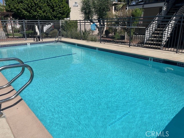 This 2 bed 2 bath 2 story unit is located in the Sunset Villas Complex and the entire building was recently renovated The exterior of the property was completely remodeled with new exterior paint , all new landscaping, remodeled pool area with 2pools and a spa , laundry facilities on site and upgraded Air Conditioning and new windows. The parking are and driveway were resurfaced, new exterior lighting and security camera system. The unit itself has just been completely renovated with all new appliances including refrigerator, microwave, stove and dishwasher. Wood floors, new paint, new blinds and new hardware and ceiling fans and granite countertops. Unit is available for yearly lease or longer.