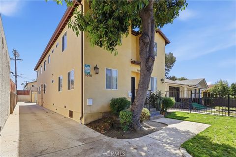 Photo of 1614 W 39th Place, Los Angeles, CA 90062 (MLS # OC26089547)