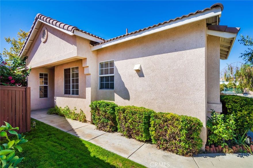 Great home in the gated  age restricted community of Rancho San Jacinto.  Clubhouse, pool, walking trails, outdoor BBQ , meeting room and fun activities.  This home has paid Solar and an EV plug in the garage.  The kitchen is open with high ceilings, corian counters and is bright and cheery. through out makes the home very light. The owner just installed new carpet .. The association maintains all front lawns and green belts giving the entire community a well maintained look. Low taxes and HOA.

Designated RV parking available.