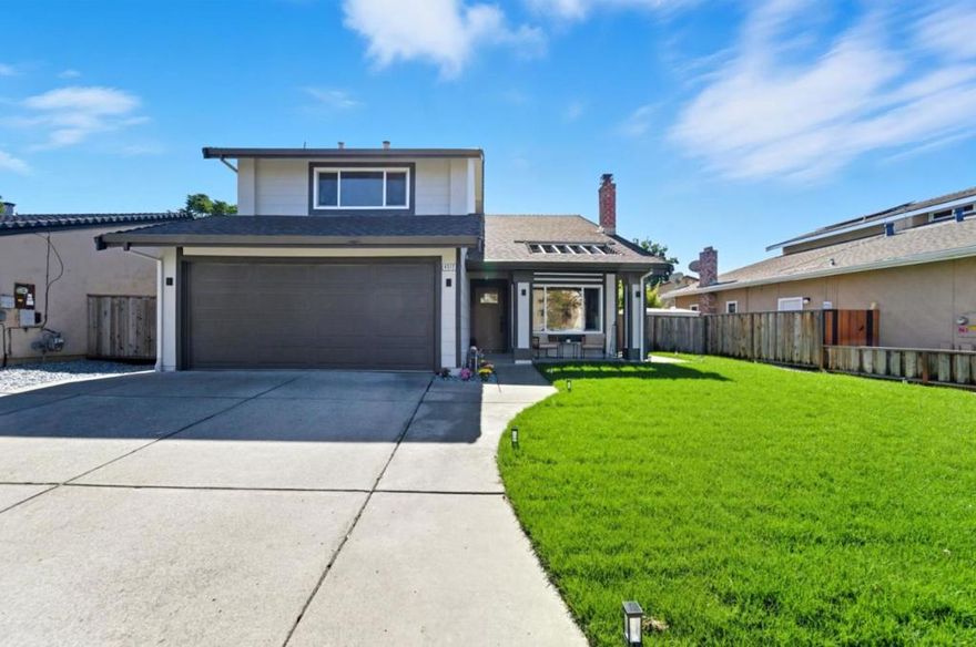 This beautifully remodeled home has been upgraded from top to bottom with quality finishes and thoughtful design. The exterior features fresh paint, new windows, doors, and upgraded landscaping with a tiled patio, new lawn, and drip irrigation system. Inside, enjoy an open layout with new wall textures, designer paint, and luxurious hardwood floors throughout. The custom two-tone kitchen includes quartz countertops, a designer tile backsplash, and KitchenAid stainless-steel appliances. All bathrooms have been fully remodeled with European tiles, LED mirrors, and premium fixtures. Additional upgrades include copper plumbing, a new water heater, upgraded electrical panel, LED recessed lighting, a new HVAC system with Nest thermostat, and an electric fireplace. The finished garage includes a new opener, side yard access, and a new gate. Every detail has been carefully modernized for comfort, efficiency, and style.  Easy commute to Silicon Valley tech giants. Walking distance to Excellent Ardenwood Elementary and beautiful park! Desirable Northeast facing home.