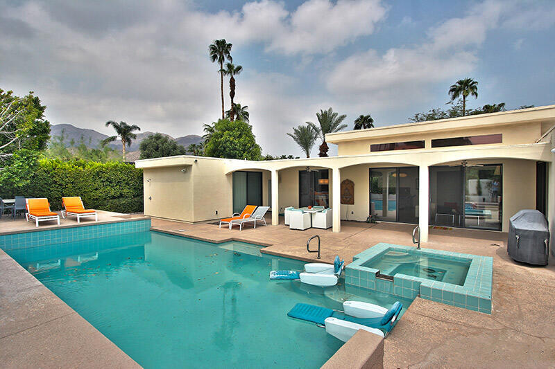 AVAILABLE FOR 2025-2026 SEASON! (4 month minimum lease). South Palm Desert home with South-facing yard and pool! This great classic is highly updated and retains the cool factor! Stunning mountain views and south sun from the patio and pool area, with covered area for dining, new fire feature with seating and a misting system. The open great room encompasses the remodeled kitchen, and living/dining areas. Beautiful limestone floors, high ceilings and great light throughout. The cozy den off the great room has a fireplace - ideal space for watching TV/reading. The 3 bedrooms/3 bathrooms are well-situated for privacy - granite counters in bathrooms. Front yard is gated for added privacy. Not in a development.