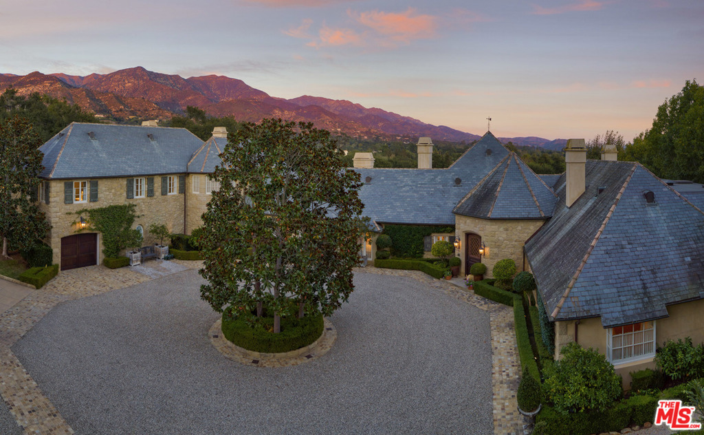 Breathtaking French Country Estate on coveted Picacho Lane, Montecito. This Majestic Manor is nestled on apx. 4.5 (nearly all flat) acres framed by picturesque Santa Ynez Mountain views in the heart of the legendary Golden Quadrangle. Major renovations & expansions by noted architect Don Nulty, AIA. Escape to the security & safety of this walled/gated parcel with apx. 12,000sf of livable space, including a separate accessory Guest Suite, Pool House w/ full Kitchen, Multiple Garages, Converted Stables, Saltwater/Solar Swimmers Pool, Sustainable Vegetable Gardens & Citrus Grove, Running Stream & Koi Pond, N/S Pro. Tennis Court & Outdoor BBQ Ranch. Minutes from Montecito's charming Upper Village, world-class lodging, hiking trails, pristine beaches & sought-after MUSD.