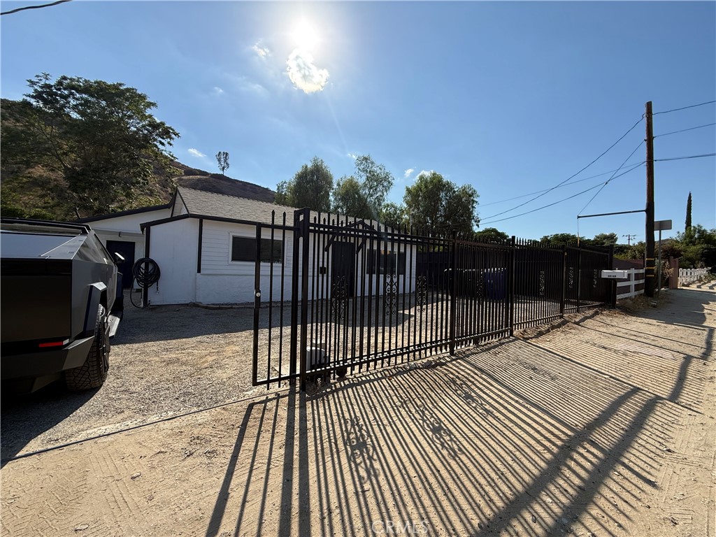 Welcome to your dream duplex in the heart of Castaic—where small-town charm meets modern living. This beautifully remodeled property offers the perfect balance of comfort and opportunity: a cozy 2-bedroom, 1-bath home for starting your homeownership journey, paired with a smart 1-bedroom, 1-bath unit that’s ideal for savvy investors.
Step inside the spacious two-bedroom unit and discover a haven of fresh, modern upgrades. Everything feels brand new—from the sleek kitchen and updated bathroom to the stylish new flooring and energy-efficient windows that fill the space with natural light. Comfort is assured year-round with new appliances, a water heater, and a reliable AC and heating system. With a new roof and electrical panel already in place, you’ll enjoy lasting peace of mind.
Outside, a generous backyard invites endless possibilities—create the perfect outdoor retreat, start a garden, or plan for future expansion. Plus, with no HOA or Mello Roos, you’re free to enjoy the property your way.
The location adds even more appeal. Scenic hiking trails, a welcoming community park, and a refreshing pool are all nearby. Castaic Lake offers boating, fishing, and outdoor adventures just minutes away, while a leisurely drive down Highway 126 leads you straight to Ventura Beach for the perfect coastal getaway. A brand-new wrought iron fence completes the property, adding both charm and security.
This is more than a home—it’s an investment in your future. Whether you’re a first-time buyer or an investor expanding your portfolio, this Castaic duplex is a rare opportunity you won’t want to miss. Schedule a private showing today and turn your real estate goals into reality