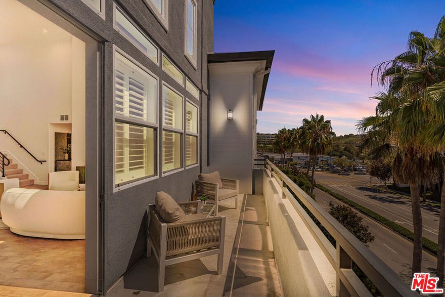 On top of everything else, there is a 3rd bedroom option! Style, light, and location come together seamlessly! Step inside and you're immediately greeted by dramatic soaring ceilings and walls of glass that flood the home with warm California sunshine. A huge west-facing balcony overlooks the bluffs, offering the perfect vantage point for unforgettable sunsets night after night. The open-concept kitchen and dining area were designed for effortless entertaining, while a versatile loft flex space adapts to your lifestyle easily serving as a third bedroom, home office, or creative studio. Both bedrooms share the same lofty, spacious ceilings, adding to the sense of volume and airiness. The crown jewel of the home is the expansive master suite, occupying its own wing and creating a private retreat that feels every bit the part of a penthouse. And when it comes to location, it doesn't get better: just a block from The CenterPointe Club with its pool, fitness center, and social spaces, and equally close to trails, sports courts, the Playa Vista library, and highly rated Playa Vista Elementary. Large storage units above parking! Walk through: https://youtu.be/x_1q9CV45Ik?si=C_uVEZDirraHlO8m