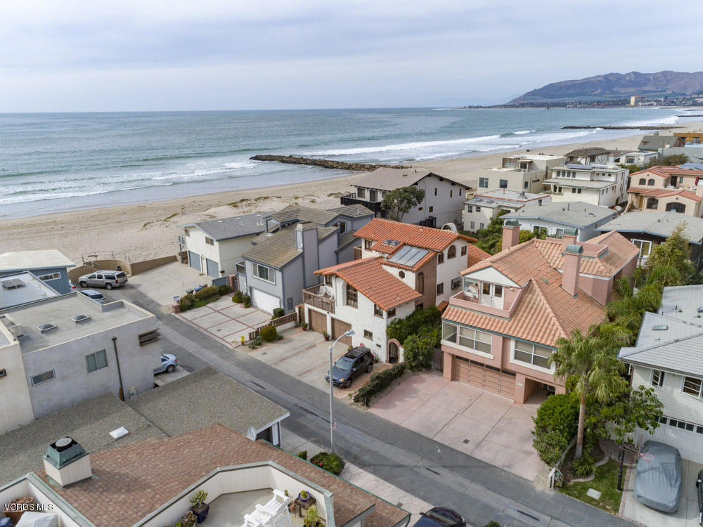 For Lease! This Fully Furnished, piano too, well appointed and well loved home is just 4 lots (150 ft) from the sand on one of the best Ventura Beach Lanes and just a few minutes from shops and dining. This Spacious 3 story home features Ocean Views from several rooms, Open Kitchen with gas cooktop, large refrigerator, Living room with Fireplace, Laundry Room, 2 bedrooms and bath conveniently located on ground floor, 2 large viewing decks, new dual pane windows throughout, hardwood & tile floors almost throughout. Fully Fenced Yard. Perfect for Vacation! 30 Days minimum stay. Please contact agent or your agent for Summer rates.