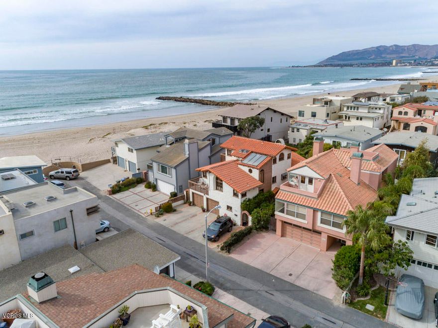 For Lease! This Fully Furnished, piano too,  well appointed and well loved home is just 4 lots (150 ft) from the sand on one of the best Ventura Beach Lanes and just a few minutes from shops and dining.  This Spacious 3 story home features Ocean Views from several rooms, Open Kitchen with gas cooktop, large refrigerator, Living room with Fireplace, Laundry Room, 2 bedrooms and bath conveniently located on ground floor, 2 large viewing decks, new dual pane windows throughout, hardwood & tile floors almost throughout.  Fully Fenced Yard.  Perfect for Vacation! 30 Days minimum stay. Please contact agent or your agent for Summer rates.