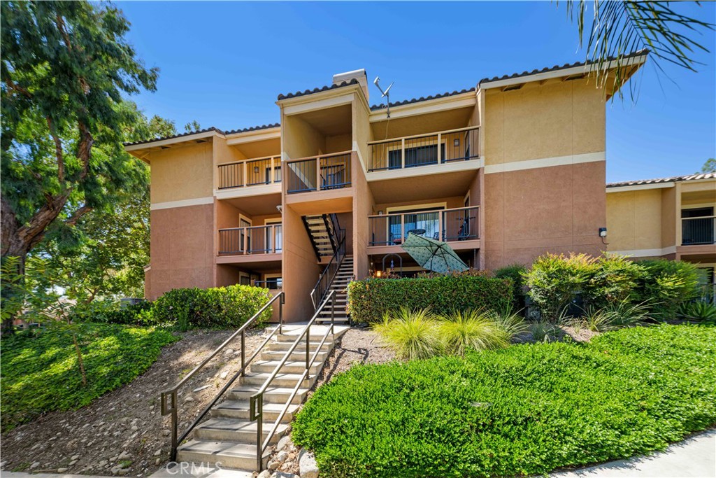 Welcome to this pet friendly and move-in ready 2-bedroom 2-bathroom condo nestled in the desirable Borgata gated community. This spacious condo has total living space of 1008 square feet, sitting on the top floor for ultimate privacy and quiet environment. From the balcony you can see beautiful mountains and trees, and the community swimming pool and the tennis court right below. From the master bedroom you can view a creek running beside the building and fall asleep with the soothing water sounds. The property is upgraded with brand new carpet in rooms, brand new high grade vinyl flooring in the kitchen, brand new quartz countertops, and brand new stainless steel appliances. Recessed lights throughout the living and dining areas and tiles in the two bathrooms were installed and the two shower valves were replaced 2 years ago. The property has an in-unit laundry area and a large sliding door to the balcony with central heating and air conditioning. The community offers three swimming pools, a relaxing spa, a tennis court, several BBQ areas, a clubhouse, and lush greenbelts with peaceful creeks. The HOA fee covers water, trash, sewer, and landscaping, you only need to pay electricity and enjoy all the amenities without any hassle of maintenance. There are two assigned parking spaces (one covered carport, one uncovered). And the community is located near the 210 freeway, Trader Joe’s, shops, restaurants, Chaffey College, and the sought-after Alta Loma school district. Don’t miss this great opportunity.