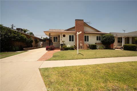 Photo of 12315 Pomering RD, Downey, CA 90242 (MLS # DW26138128)
