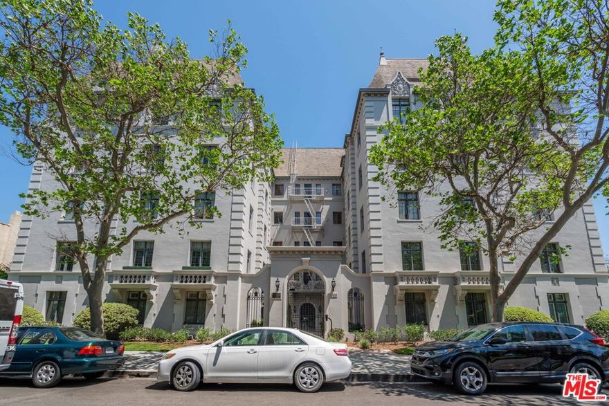 Come enjoy this rare opportunity to live at the exquisite, Faubourg St. Denis, designed by architect, James N. Conway. Enter this thoughtfully planned 1 bedroom, first-floor unit that includes beautifully engineered wood flooring, crown moulding, and plantation shutters. The inviting, sun-filled living room seamlessly flows into the cozy dining area. The well-equipped kitchen features stainless steel appliances and dark stone countertops. Enjoy the convenience of in-unit laundry and a wonderfully zen bedroom. Other amenities include on-site parking, building security, pool, spa, gym, and beautifully landscaped grounds. Conveniently located moments from acclaimed restaurants and retail along with Ralphs, Trader Joes, Whole Foods, Erewhon Organic Grocer & Cafe and Target. Experience the perfect pairing of old Hollywood glamour with modern convinces of today!