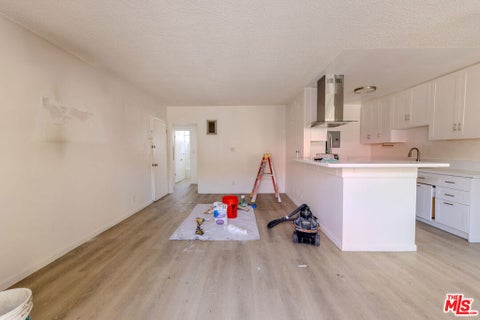 Photo of 1426 S Orange Grove Avenue, Los Angeles, CA 90019 (MLS # 26870011)