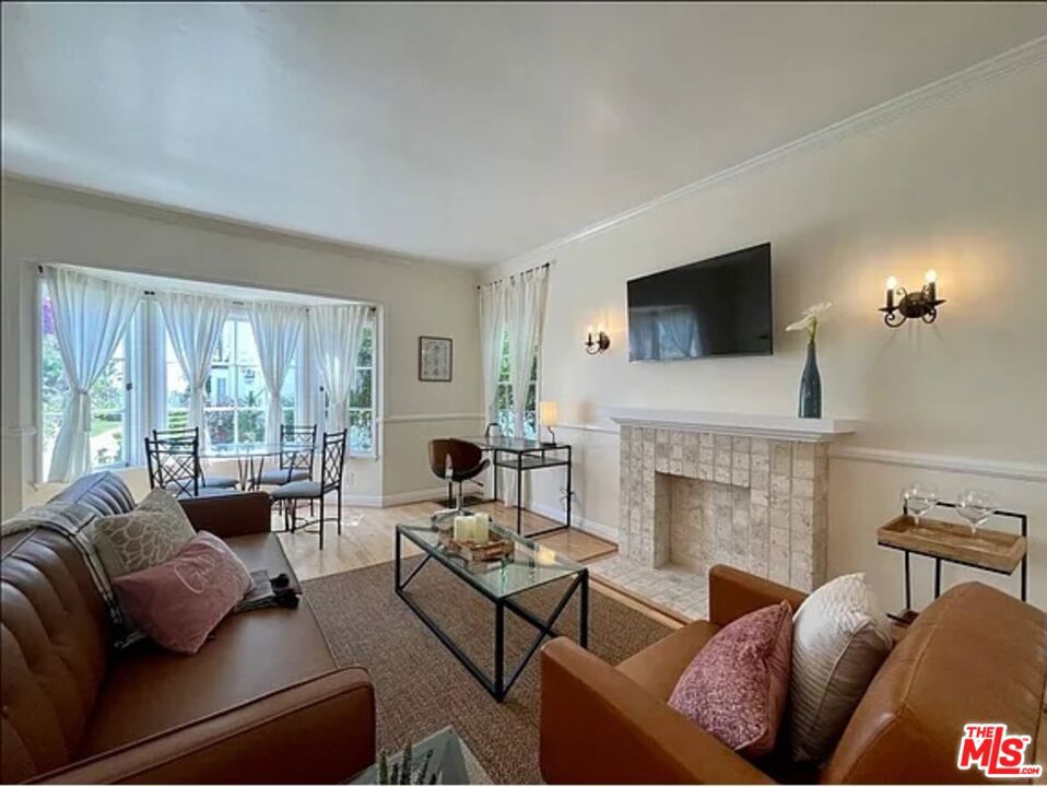 Charming 2BD/1BA in Historic 1920s Courtyard Building with Ocean Views Enjoy stunning ocean views from the living room of this beautifully updated apartment, located in a classic 1920s courtyard property. Just a few steps from the entrance, this unit features: Central A/C for year-round comfort Gorgeous hardwood floors throughout Modern kitchen with stainless steel appliances and brand-new granite countertops Private in-unit washer and dryer Access to a serene shared courtyard Gated entry for added security Underground parking (first come, first served)Located just a short walk from the vibrant shops, cafes, and restaurants on Montana Avenue. Lease Details: Water, sewer, and trash included Tenant responsible for gas & electricPet-friendly1-year lease No smoking