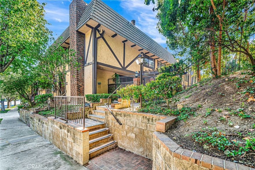 Welcome to this LARGE & UNIQUE townhome in the most desirable Woodland Hills neighborhood. This gorgeous end-unit feels JUST LIKE A HOUSE with its 3 bedrooms & 2.5 bathrooms, workout room downstairs & a loft upstairs! The unit is located on the quiet side of the complex & has lots of UPGRADES such as a remodeled kitchen with modern stainless steel appliances & stone counter-tops, remodeled bathrooms & wood floors throughout. You step in through the elegant double door entry into a large living room with a fireplace & tall french doors leading to an outdoor shady PATIO to enjoy your morning coffee or summer BBQ events. You will enjoy the view from the kitchen facing community POOL & SPA area. The adjacent dining room and the guest bathroom downstairs are convenient for family & friends gatherings. The spacious master suite upstairs offers two walk-in closets & a large dual-sink bathroom with a separate walk-in shower & a bathtub. Two other bedrooms share another bathroom & the loft area is bathed in the natural sunlight through its large windows. The multiple staircases give this home a LUXURY look! There is a HUGE 3-car attached garage with a laundry area & lots of storage space. The parking area is GATED as well to protect its homeowners' privacy. The community has its own private TENNIS COURT, pool & spa to enjoy year round!