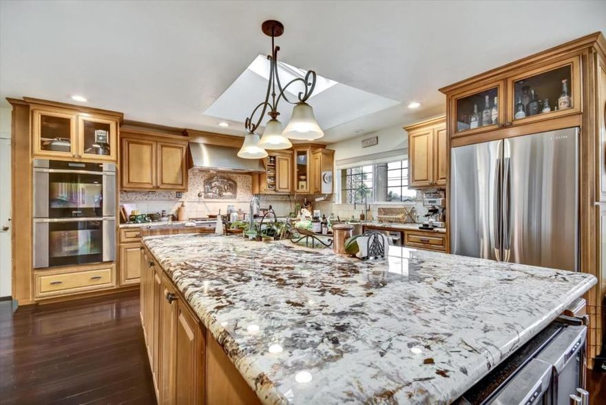 Welcome to this charming 4-bedroom, 2-bathroom home located in the vibrant city of San Jose. With a spacious 1,727 square feet of living space, this residence offers a welcoming atmosphere and a variety of appealing features. The well-appointed Chef's kitchen provides ample space for cooking and entertaining with a professional gas range and a very large island. Marble countertops and custom cabinetry , seamlessly connecting to the dining area within the living room, perfect for family gatherings and cozy meals. The home is equipped with central AC and central forced air-gas heating, ensuring year-round comfort. Enjoy the warmth and ambiance of the fireplace on cooler evenings. The property features a convenient laundry area, simplifying daily chores. Situated on a ,000 square feet lot it has multiple areas for outdoor relaxing and entertainment, a true backyard oasis with water features and Lucious greenery.  With a 2-car garage, you'll find plenty of storage and parking space. It also has a solar system to lower your bills.  Don't miss the chance to make this San Jose gem your own!