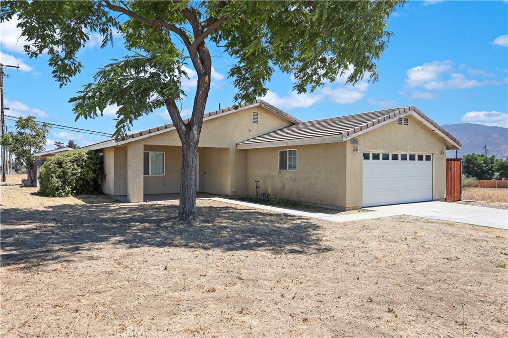 Charming 3-Bedroom Home on Expansive Corner Lot
Bright and inviting, this 1,613 sq ft home built in 2006 offers 3 bedrooms, 2 baths, the granite-accented kitchen overlooks the dining area and flows seamlessly into a comfortable living space. Enjoy the main suite with dual-sink bath, indoor laundry, a generous corner lot features a spacious backyard with huge potential, spacious storage to keep all organized and spacious two-car garage. Conveniently located just a few miles from Morongo Casino and Cabazon Outlets.