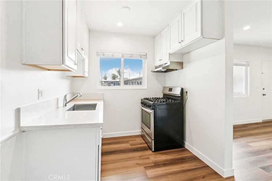 Newly remodeled upstairs unit in a gated building. Stainless steel gas stove, granite kitchen counter tops, hardwood floors throughout, heat, A/C, ceiling fans, recessed lighting, completely new unit includes one (1) dedicated parking space. Building includes laundry room with wifi and bluetooth enabled washer / dryers (get an alert when your wash is ready!), pool with tables and loungers, gated entry with telecom, security cameras, and on site resident manager. Rent includes water, hot water, sewer, trash, gardener, assigned parking space, access to laundry room, access to pool and facilities. Call for information, same day showings possible!
