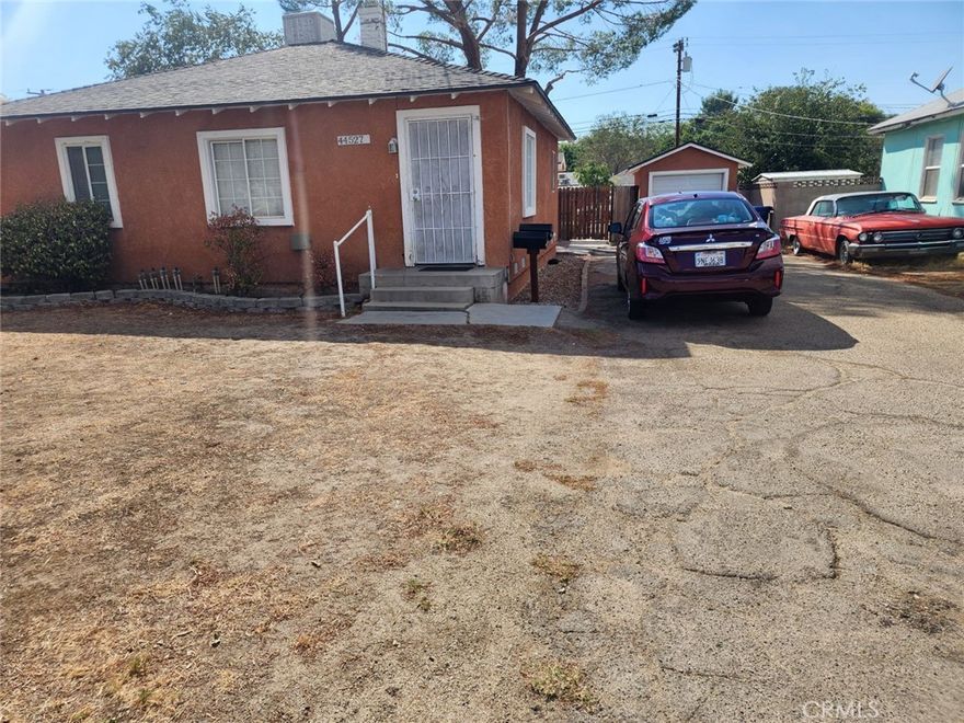 This is a very nice, well-maintained unit. It is a 2-bedroom, 1-bath, and is gated. There is a 2-car garage as well as a pretty nice sized yard. Get it while it lasts!!! Section 8 welcome.  Water, gas, gardener included.  The unit is part of a duplex and is the back unit (enter from the alley).