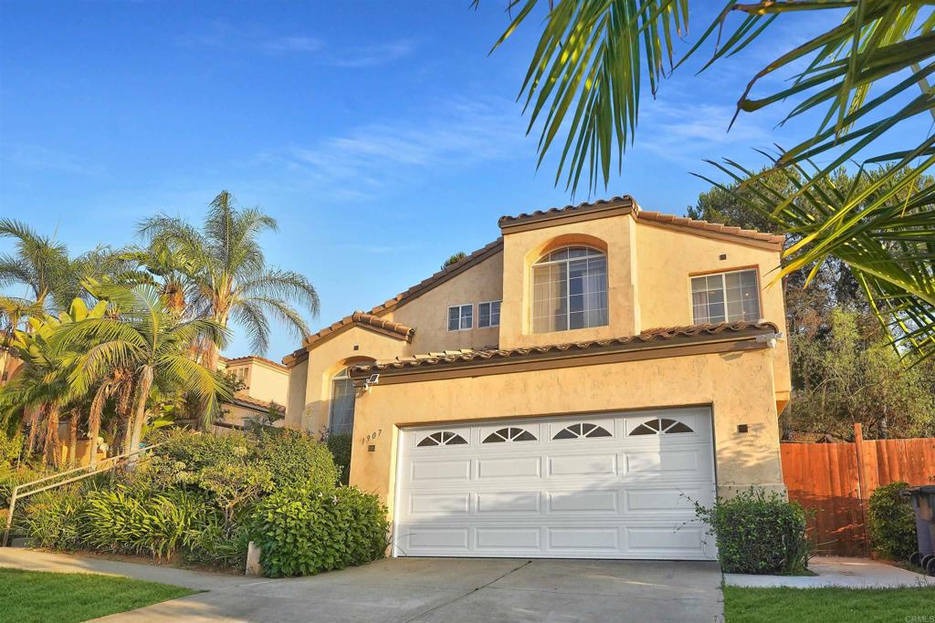 This spacious and versatile four-bedroom, two and a half bath multi-level residence offers a blend of style, comfort and functionality ideal for modern family living. The thoughtful multi-level layout provides distinct living areas, perfect for entertaining, family gatherings, or finding a quiet retreat. The main floor features an open floor plan, where a well-maintained tile flooring flows seamlessly into a cozy kitchen equipped with a brand new stainless steel refrigerator. The main living area features a warm fireplace, making it the ideal spot to relax and read a great book. The half bathroom is conveniently located on the first level next to the garage and a dedicated laundry room with large sink. The next floor houses a generous primary suite, which includes a private en-suite bathroom, luxurious spa bathtub and a spacious walk-in closet. Three additional bedrooms are conveniently located on the top level providing plenty of space for a growing family, guests, or a home office. These rooms share a full bathroom. There is a large covered patio in the rear of the house which offers a private outdoor retreat for relaxing or entertaining. The home also features plenty of fruit and vegetables, including large red chili peppers and a mature green apple tree. This home is a perfect option for those seeking spacious living with a smart and functional layout that can adapt to their changing needs. This home is priced to sell and it won't last long! Come see it today!