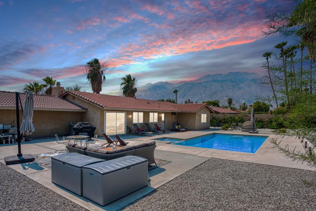 Furnished Home! Beautifully remodeled 4-bedroom, 2-bathroom home in the heart of Palm Springs. Enjoy expansive, unobstructed views of the San Jacinto Mountains in a serene and private setting. Recent upgrades include remodeled kitchen and bathrooms, new plank flooring, roof, dual-pane windows, ceiling fans, and smart-home systems. The kitchen features custom cabinetry, premium countertops, and high-end appliances. Both bathrooms offer sleek modern finishes, and abundant natural light fills the home through newly installed windows.Exterior updates include a new roof, fresh yard walls, and a stylish iron side gate. The pool and Jacuzzi feature a new jet pump and smart equipment controller for easy maintenance. Smart thermostat and smart irrigation add to the convenience.Buyer owns the land--no HOA fees! RV or boat parking included. This upgraded retreat combines modern comforts, stunning views, and prime location--an exceptional opportunity for luxury living in Palm Springs.