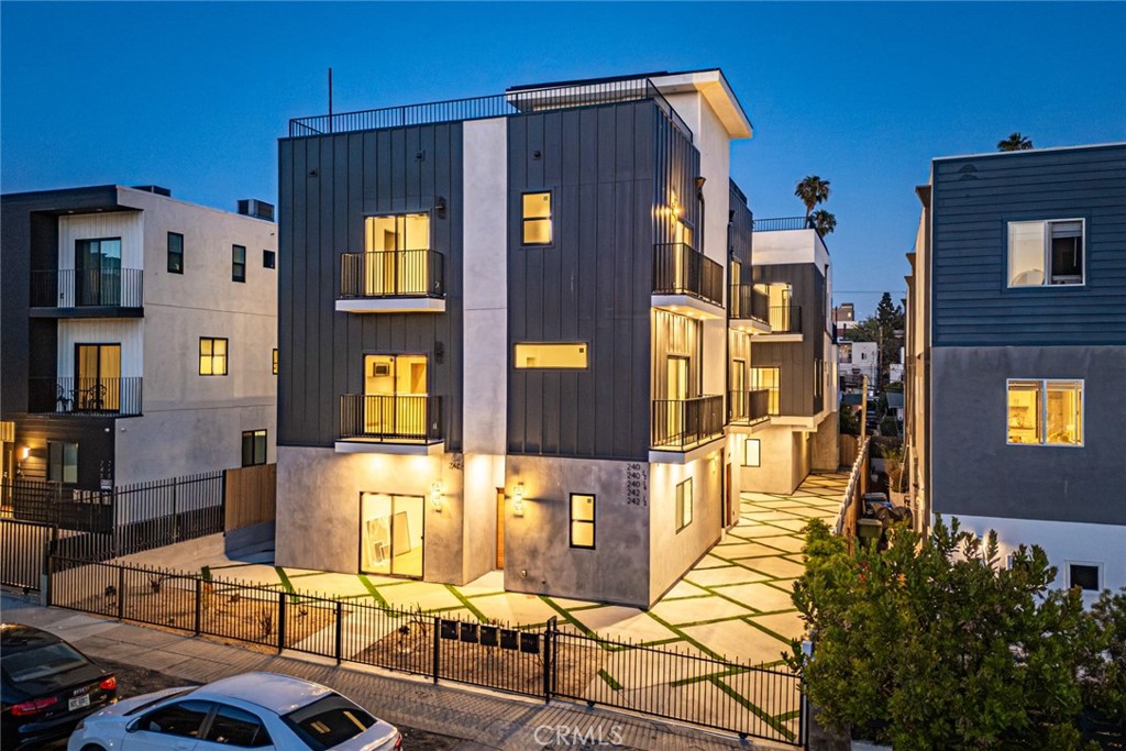 242 N Dillon is a brand-new, NON-RENT-CONTROLLED 2025 five-unit luxury community located just seconds from Silver Lake, one of LA’s most sought-after rental markets. This architectural gem combines prime location, high-end finishes, and strong returns, offering investors a projected 5.68% cap rate with minimal expenses.
Set on a gentrifying street with standout curb appeal, 242 N Dillon features five expansive units — including one massive 5-bedroom tri-level townhome (2,356 SF) and four oversized 4-bedroom units — all with private entrances and thoughtfully designed, renter-friendly floorplans. Each unit is separately metered for all utilities and comes with a full 1-year builder’s warranty, ensuring low maintenance and long-term stability.
Luxury features include designer tile, custom cabinetry, stainless steel appliances, oversized kitchen islands, high ceilings, balconies, large closets, and stunning 360-degree rooftop decks. The building is enhanced by drought-tolerant landscaping, ample parking, and natural light throughout.
With no rent control, high-income potential, and top-tier design, 242 N Dillon is a rare opportunity to own a high-performing, low-maintenance asset in one of LA’s most competitive rental corridors. Don’t miss your chance to secure a trophy property in this highly desirable rental pocket of LA.