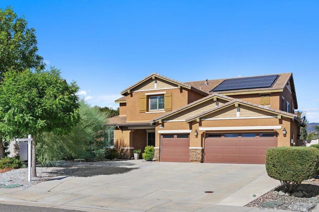 Welcome to this rare “Home Within a Home,” thoughtfully designed for multigenerational living, a spacious in-home office, or rental income to help offset the mortgage. But first, the main house! The chef’s kitchen showcases a huge island, double ovens, gas cooktop, and granite counters, all opening to the great room with an airy floor plan that is perfect for holiday parties, casual get-togethers, or just relaxing with family and friends. Upstairs, the primary suite is set apart from four secondary bedrooms and a generous loft, creating a private retreat for peace and quiet. The ensuite features dual vanities, a soaking tub, separate shower, and walk-in closet. The private Next Gen suite is a standout with its own entrance, full kitchen, living room, bedroom with retreat, full bath, laundry, and plenty of storage. Ideal for extended family, long-term guests, or rental opportunities. On one of the largest lots in the neighborhood, the backyard is ready for your imagination. Whether it's a pool, outdoor kitchen, pickleball court, guest house, or all of the above, you'll find plenty of space for it. Set in a quiet, friendly neighborhood, this home is close to shopping, dining, hospitals, and freeway access. Outdoor adventures are nearby with trails, campgrounds, and the lake just minutes away. Only 15 minutes from Temecula wine country and within commuting distance to San Diego and Irvine, it is the perfect place to live big and love where you live.