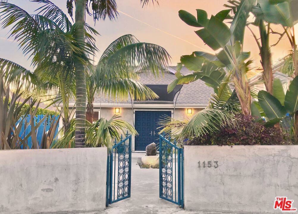 For Lease: An Architectural Oasis in the Heart of West Hollywood. Step into this stunning designer's architectural home, offering 2 bedrooms, 2 bathrooms, and an expansive upstairs loft ideal for a home office, creative studio, or a cozy guest retreat. Perfectly situated on a quiet, tree-lined street just steps from West Hollywood's most iconic restaurants, cafes, nightlife, and only a 5-minute walk to Trader Joe's. This charming residence blends timeless character with modern comforts. Exotic hardwood floors, original architectural details, and abundant natural light give the home a warm and inviting ambiance. The spacious living room features dramatic cathedral ceilings, a gas fireplace, and large windows that frame lush greenery and the wraparound wood deck.The updated kitchen boasts sleek stainless steel appliances and elegant stone countertops, making it a delight for any home chef. Both bedrooms are generously sized with en-suite bathrooms, Italian custom-built closets, and French doors that open to a serene, private backyard oasis perfect for relaxing or entertaining. The detached garage has been thoughtfully converted into a versatile flex space, ideal for a home gym, playroom, studio, or additional workspace. Adjacent to this space is a separate laundry room, complete with washer, dryer, sink, ample cabinetry, and countertop space. The backyard is a true retreat, featuring a central gas fireplace, tranquil fountain, and stylish lounge area perfect for outdoor dining and al fresco gatherings. Don't miss this rare opportunity to live in one of West Hollywood's most desirable locations.