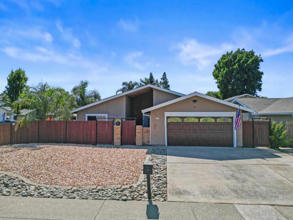 This home comes with an *assumable VA loan* at a 2.49% interest rate. save thousands compared to todays rates!!! Welcome to your beautiful home just one block from the scenic American River! This charming single-story residence offers the perfect blend of comfort, style, and location. Step into a bright living room with vaulted ceilings, warm wood-style flooring, and a custom blue-mantled fireplace. The open kitchen is a chefs dream with rich wood cabinetry, a large island, stainless steel appliances, and quartz countertops. Enjoy four spacious bedrooms, including a primary suite with mirrored closets and a private en-suite bath. The low-maintenance backyard features a covered patio, space to garden or play, plus a paved side yard with **RV access**, a storage shed, and a basketball hoop. Located near parks and trails along the American River, this home offers both tranquility and convenience.
