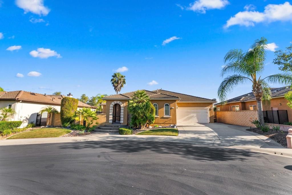 Photo of 241 Melbourne Glen Gln, Escondido, CA 92026 (MLS # PTP2602333)
