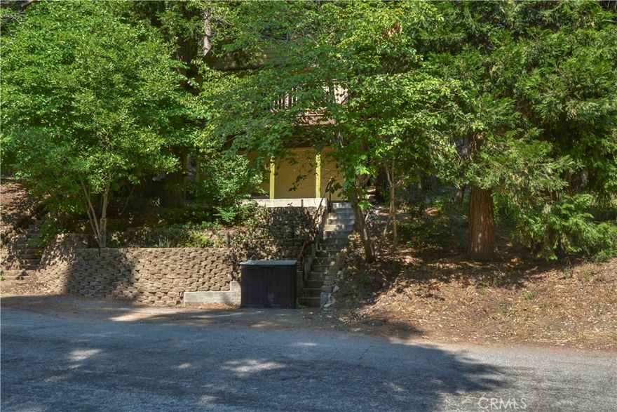This cute cabin nestled in the trees of the Arrowhead Villas. Great mix of an old cabin with newer up to date amenities. Sits on top of Arrowhead Villas road hidden by a few mature trees for privacy. Beautiful pine T&G wood walls. Hardwood floors run throughout the home as well. This could be your little cabin away from it all.Sits on a corner lot which helps give you a more private feel. Home is also an active Airbnb with outstanding reviews.