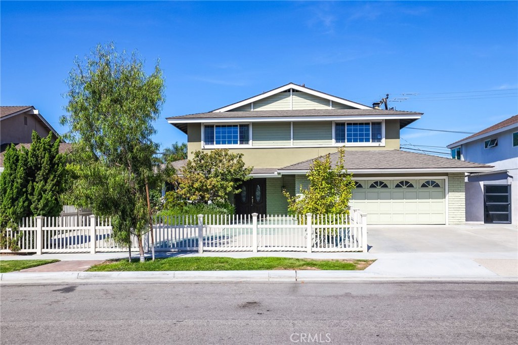 Welcome to this stunning 4-bedroom, 2.5-bathroom home located in Huntington Beach, CA. This two-story gem boasts a large family room with an open floor concept, perfect for entertaining or relaxing. The upgraded kitchen is a chef's dream, complete with stainless steel appliances and recessed lighting. The master suite is a private retreat, featuring a walk-in closet and dual vanity sinks. The home also includes a 2-car attached garage, double pane windows, and tile flooring throughout. Step outside to your own personal oasis, complete with a pool, fire pit, and built-in barbecue. The property is enclosed by a charming white picket fence, adding to its curb appeal. With a fireplace for cozy evenings and a built-in barbecue for summer cookouts, this home truly has it all. Experience the best of Huntington Beach living in this beautiful home.