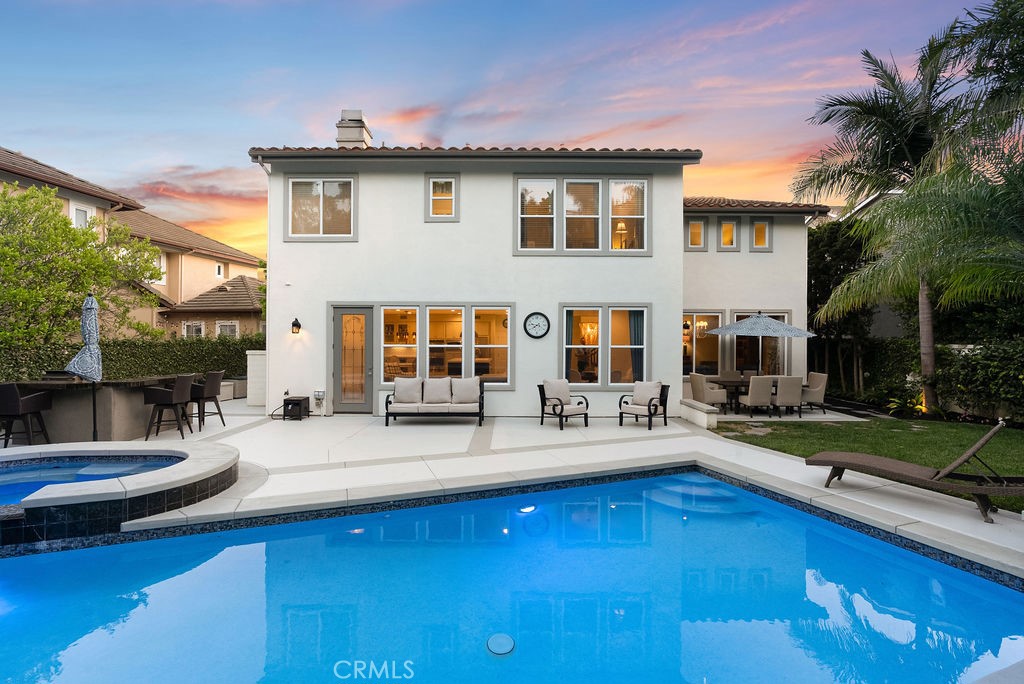 Welcome to your private pool home in Talega’s highly sought-after Monterey tract! With 4 bedrooms, 3 bathrooms, and 3,415 sq ft of living space, this residence updated in 2024 sits on a spacious 7,214 sq ft lot offering privacy, functionality, and style throughout. Inside, all four bedrooms are located upstairs along with a large bonus room and an updated bathroom featuring dual sinks, quartz counters and a walk-in shower graced with stunning designer tile work. The primary suite includes a refreshed and spacious en-suite bath with updated finishes and a large walk-in closet. Downstairs, you’ll find a dedicated office and a beautifully updated full guest bathroom. The heart of the home is the updated kitchen, showcasing quartz countertops, modern tile backsplash, a wine fridge, Wolf cooktop, and a built-in wine + coffee bar—perfect for entertaining. Fresh interior and exterior paint, new door hardware, hinges, new LED lighting and updated vinyl and carpet flooring (2024) bring a fresh, cohesive feel throughout. The fireplace has been regrouted and repainted, with lightened brick and a refinished mantle for a clean, modern look. Step outside to an entertainer's dream private backyard oasis featuring a sparkling pool and spa, refreshed hardscape, built-in BBQ, dining area and additional lawn space for play or relaxation. Additional features include a 3-car garage, newer heater & AC condensers (2020) and new water heater & pool heater (2024). This quiet cul-de-sac street close to Talega's main pool & clubhouse is a rare gem. Talega amenities include pools, parks, sport courts, trails, and top-rated schools. Don't miss this opportunity to own the upgraded coastal home you’ve been waiting for.