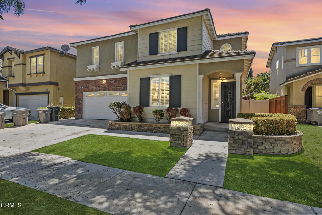 This exceptional North Oxnard residence showcases contemporary luxury and thoughtful upgrades throughout 3,032 square feet of living space. Five bedrooms and three beautifully remodeled bathrooms provide generous room for comfortable living, while the versatile bonus room invites endless possibilities as your private movie theatre or game room. The open floor plan flows seamlessly between living spaces, extending to an inviting deck perfect for California indoor-outdoor entertaining.The primary suite features a remarkable walk-in closet transformed into a luxury dressing room worthy of a fashion enthusiast's dreams. Convenience meets elegance with a main-floor bedroom and bathroom, ideal for guests or multigenerational living. The private backyard offers a covered patio and built-in BBQ station beneath a charming gazebo, creating multiple zones for relaxation and year-round entertainment.Practical luxury continues with owned solar panels eliminating electric bills, a water softener system, and a three-car tandem garage offering extensive storage and parking flexibility. Located in a desirable North Oxnard neighborhood built in 2003, this home places you minutes from The Collection at RiverPark's premier shopping and dining, renowned golf courses, and easy Highway 101 access for commuting convenience. This remarkable property represents a rare opportunity to own a turnkey home where every detail has been carefully considered and upgraded for modern living.