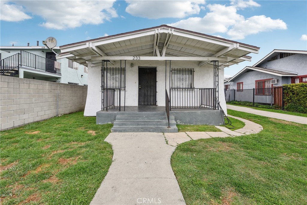 Investor Opportunity – 3 Units in Prime Los Angeles Location
Rare chance to own a fully tenant-occupied triplex in the heart of Los Angeles, perfect for the seasoned or beginner investor seeking steady rental income from day one. This unique property features a charming front 2-bedroom house and two additional 1-bedroom units, each located on the second level of their respective structures, offering privacy and elevated living.
Situated within walking distance to public transportation, shopping, and local amenities, this location offers strong tenant demand and long-term rental appeal. The property will be delivered as-is and with tenants in place, presenting a turnkey investment opportunity with no vacancy downtime.
Don't miss this solid income-generating property in one of L.A.’s high-demand rental markets.
